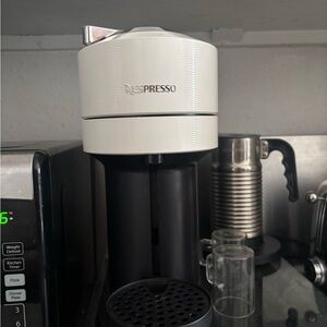 Nespresso White and Black Coffee Maker